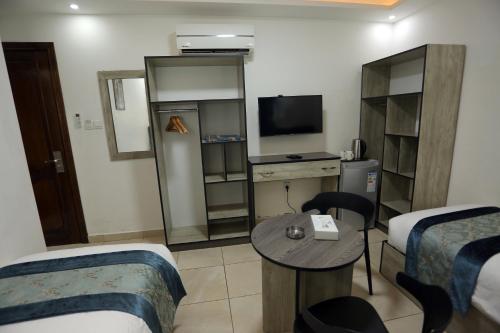 Downtown Hotel للعائلات فقط – Al' Aqabah, TX