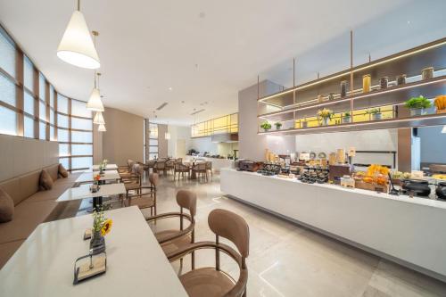 Atour Hotel Harbin Qunli Lilac Park Metro Station in هاربين