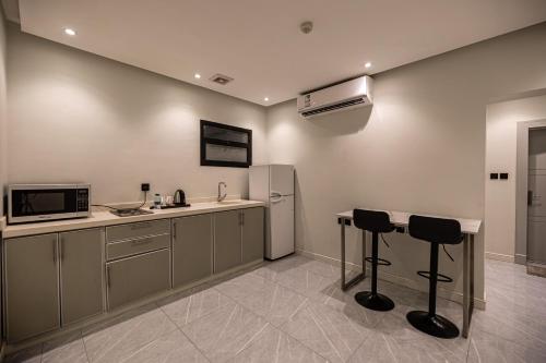 مطبخ, فندق إكس واي زد التعاون (XYZ Hotel Al Tawon) in ازدهار