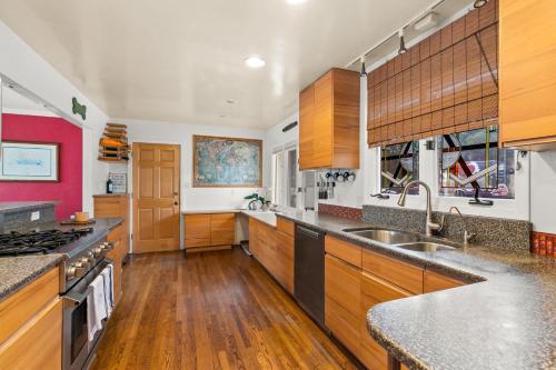 Boho-Style Point Loma Retreat Large Outdoor Deck in Wooded Area