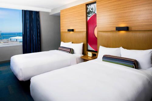 Queen Room with Two Queen Beds and Roll-in Shower - Mobility and Hearing Accessible