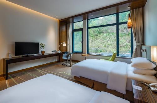 Libo Xiaoqikong Ruijing Hotel