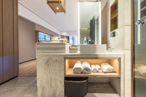 Atour X Hotel Wuhan High-Speed Railway Station West Square in Qingshan Industrial Zone