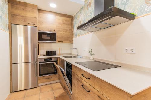 virtuve, Chalet de Aranda - Elegante Casa para 7 con jardín privado, AC y WiFi (Chalet de Aranda - Elegante Casa para 7 con jardin privado, AC y WiFi) in Illueca