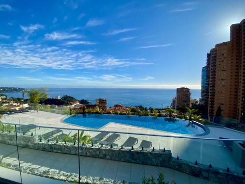 Luxury Brand New Escape for Two at 10 meters from Monaco, with Private Parking, Terrace, Infinity Pool, Stunning Views on the Sea, Monte Carlo Country Club and Beach Club