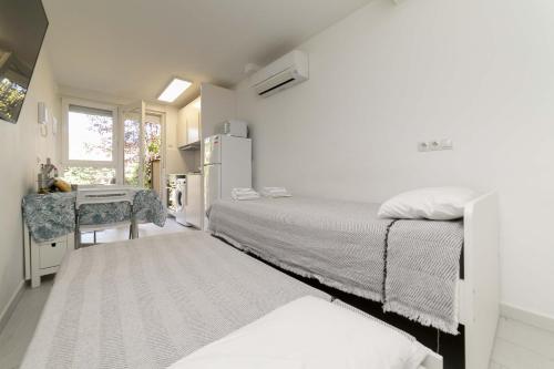 Apartamento con jardín privado (Apartamento con jardin privado) in سان فرناندو دي هيناريس