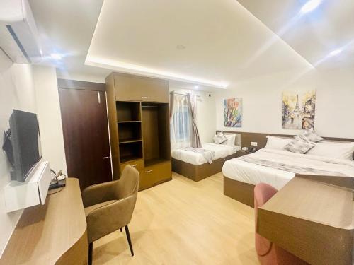 Deluxe Triple Room room in Airport Budget Hotel