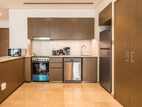 Luxurious 1BR Grande Signature Residence, Dubaj (zdjęcie 5)