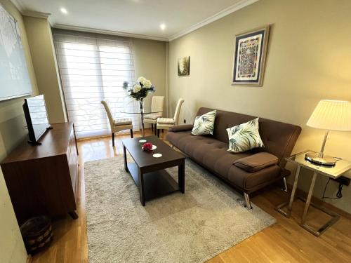 Спільний лаунж/ТБ зона, Apartamentos el Parque in Пола-де-Сьеро