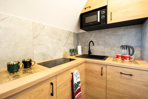 Apartamenty Podtatrzański