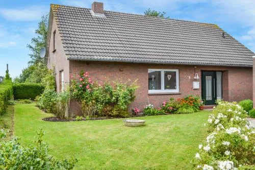 Ferienhaus am Wasser (Knockster Tief) in Hinte, Deutschland