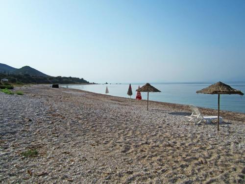 Beach, Ferouli Residence in Riza