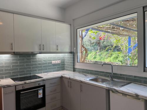 Kitchen, Peaceful home amongst olive groves by the sea in Agios Georgios