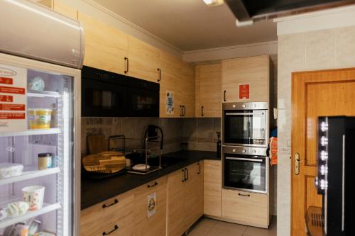 Lisbon Surf Camp & Hostel in คาลเคส