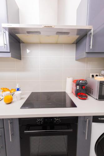 кухня, Appartement Jelyad Mallard Premium Vue Lac Parking privé 6 personnes à 10 minutes de Disneyland (Appartement Jelyad Mallard Premium Vue Lac Parking prive 6 personnes a 10 minutes de Disneyland) in Chanteloup-en-Brie