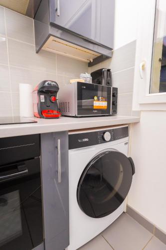 кухня, Appartement Jelyad Mallard Premium Vue Lac Parking privé 6 personnes à 10 minutes de Disneyland (Appartement Jelyad Mallard Premium Vue Lac Parking prive 6 personnes a 10 minutes de Disneyland) in Chanteloup-en-Brie