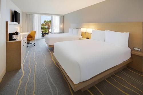 Guest room, 2 Queen, Balcony  room in Delta Hotels Daytona Beach Oceanfront