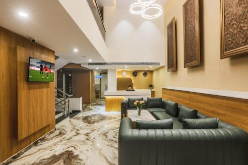 Shared lounge/TV area, The Hoften Sterling Plaza – Near Kempegowda International Airport near Ghati Subramanya Temple