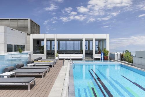 Swimming pool, Four Points by Sheraton Doha near Marzuk Grocery