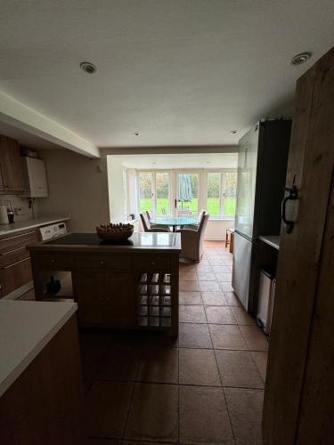 Lodge Backed by English Legacy in Ripley (Surrey)