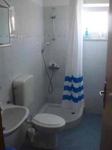 Three-Bedroom Apartment image 9