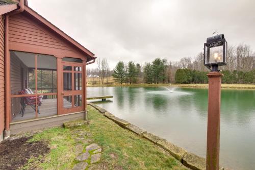 Quaint Winesburg Cottage with Porch and Pond! in Dundee, USA