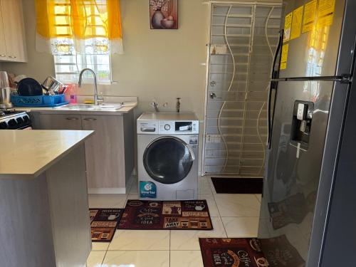 Finest Accommodation Phoenix Prk Village 1,Phase 4 lot 1347, 26 Sheawater Ave in Spanish Town