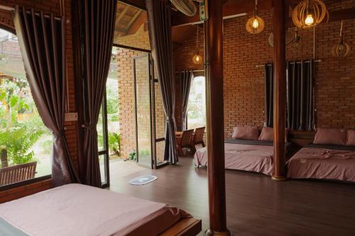 쁠래이꾸 (잘라이) Homestay Hơ Đơng (Homestay Ho Đong) 호텔 스위트룸