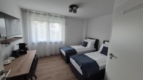 Apartments Seibel Doppel-Zweibettzimmer mit Bad in Reutlingen, Deutschland