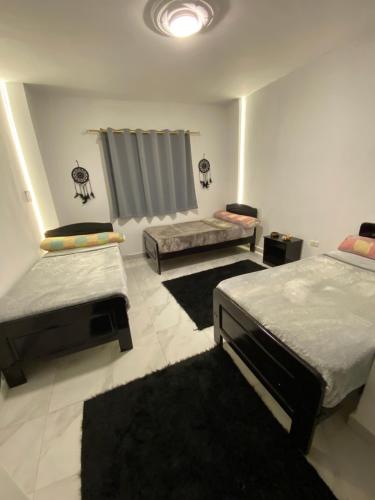 1 double bed, 3 twin beds