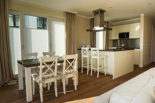 Ferienresidenz Haus Vogelflug Strandresidenz Vogelflug App 18 in Fehmarnsund