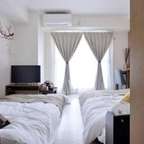 コンフィデンスロン905 Room Type - One-Bedroom Apartment