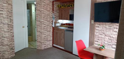 Habitación A1 Trabajar Kitchenette y baño privado