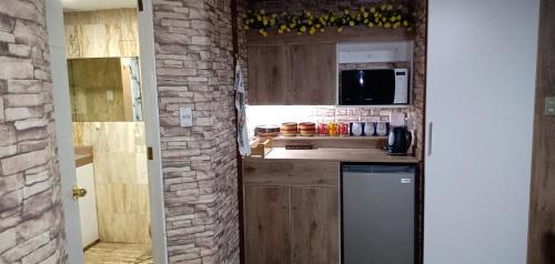 Habitación A1 Trabajar Kitchenette y baño privado