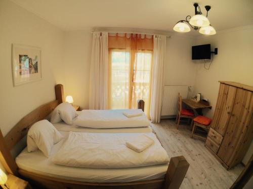 Small Double Room with Mountain and partial Lake View - First Floor