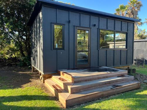 Funky west coast escape in Lake Puketi