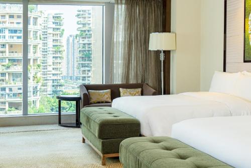 Deluxe 2 Queens Non Smoking room in Vignette Collection Palm Springs Hotel Chengdu By IHG