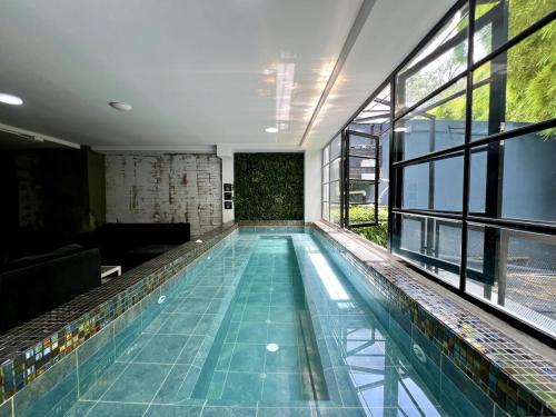 FUOCO - NOWA Apt with Bar, Indoor Heated Pool, by Lleras Park