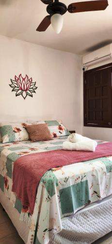 02 suítes, 700 m da praia, área c churrasqueira