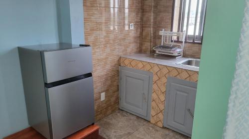 Kitchen, Carolina Lodging Apartment - Free & Fast Wi-Fi in Douala