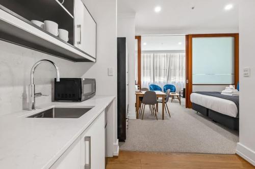 Central 1BR w Pool,Gym and Tennis Court Zodiak Stays, Auckland (fotografie 6)