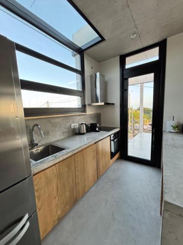 SANTAMARIADELMAR Casa a estrenar frente al mar in Manantiales