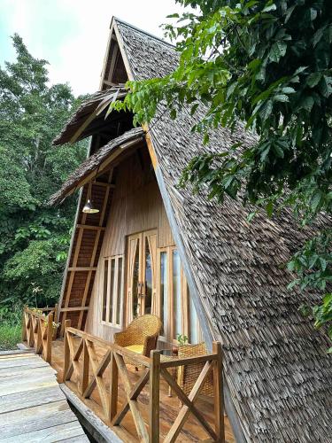 Išorė, Pamona, Namas, m²:  miegamieji: 1 vonios kambariai: 1
 (Bamboo House Dodoha Mosintuwu) in Tentena