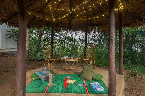 Facilities, SaffronStays Raanwaara Luxe - 2BR villa with dual balcony jacuzzis, infinity swing & private waterfa near Tung Fort