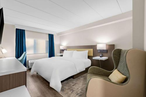 Two-Room King Suite with Sofa Bed and Walk-In Shower - Non-Smoking