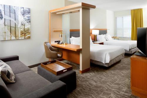 Queen Suite with Two Queen Beds and Sofa Bed