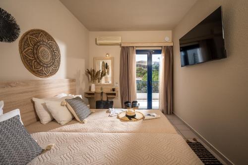 Family Room with Garden View room in Cretan Seaside Boutique Hotel