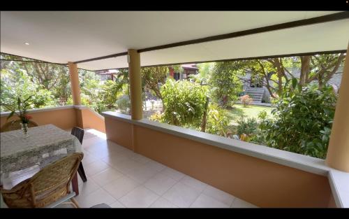 Balcony/terrace, Haus am Strand KLIMAANLAGE INKLUSIVE Sibuyan Island nahe Cresta de Gallo - Marevic's Guesthouse 1 in Marigondon