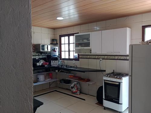 Casa no Condominio Bosque do Per Proximo a Praia in Parque Balneario Sao Francisco