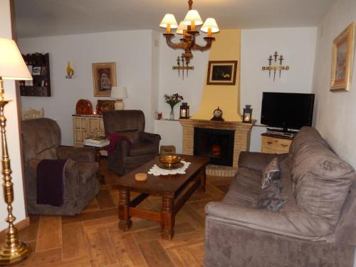 Koplietošanas atpūtas telpa ar TV, La Posada del Caminante in Santa Olalla del Cala